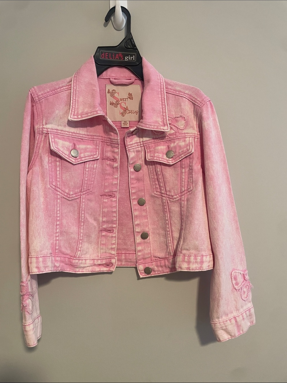 dELiA*s Pink Cropped Denim Jacket with Bow Accents